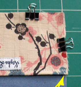 Use binder clips instead of pins when working with multiple layers of fabric and interfacing on small projects