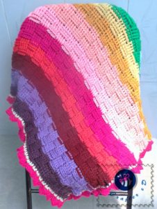 Woven rainbow baby blanket