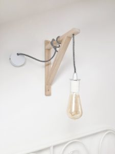 Wall Lamp with Hanging Lightbulb