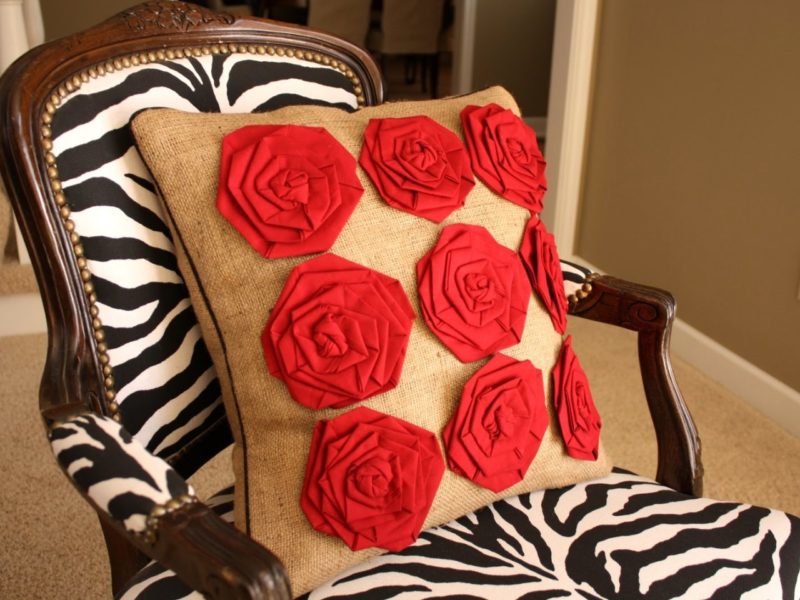 Burlap pillow with fabric flowers