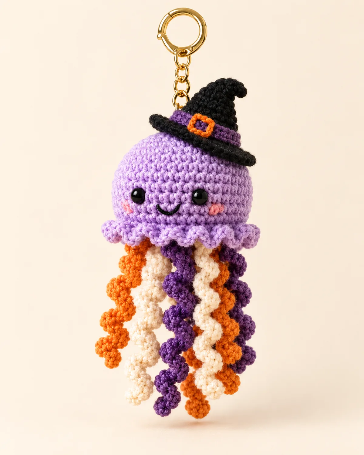 Jellyfish Keychain, finished product on a warm off-white background