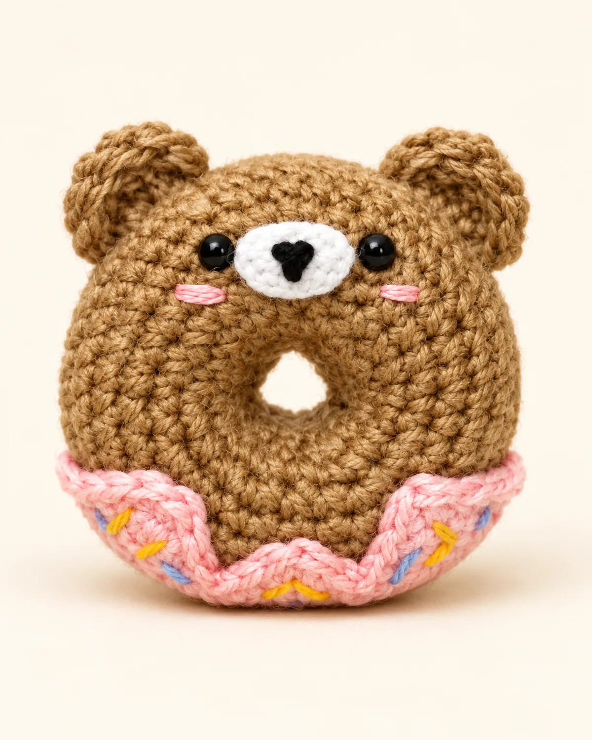 Donut Teddy Bear, finished product on a warm off-white background