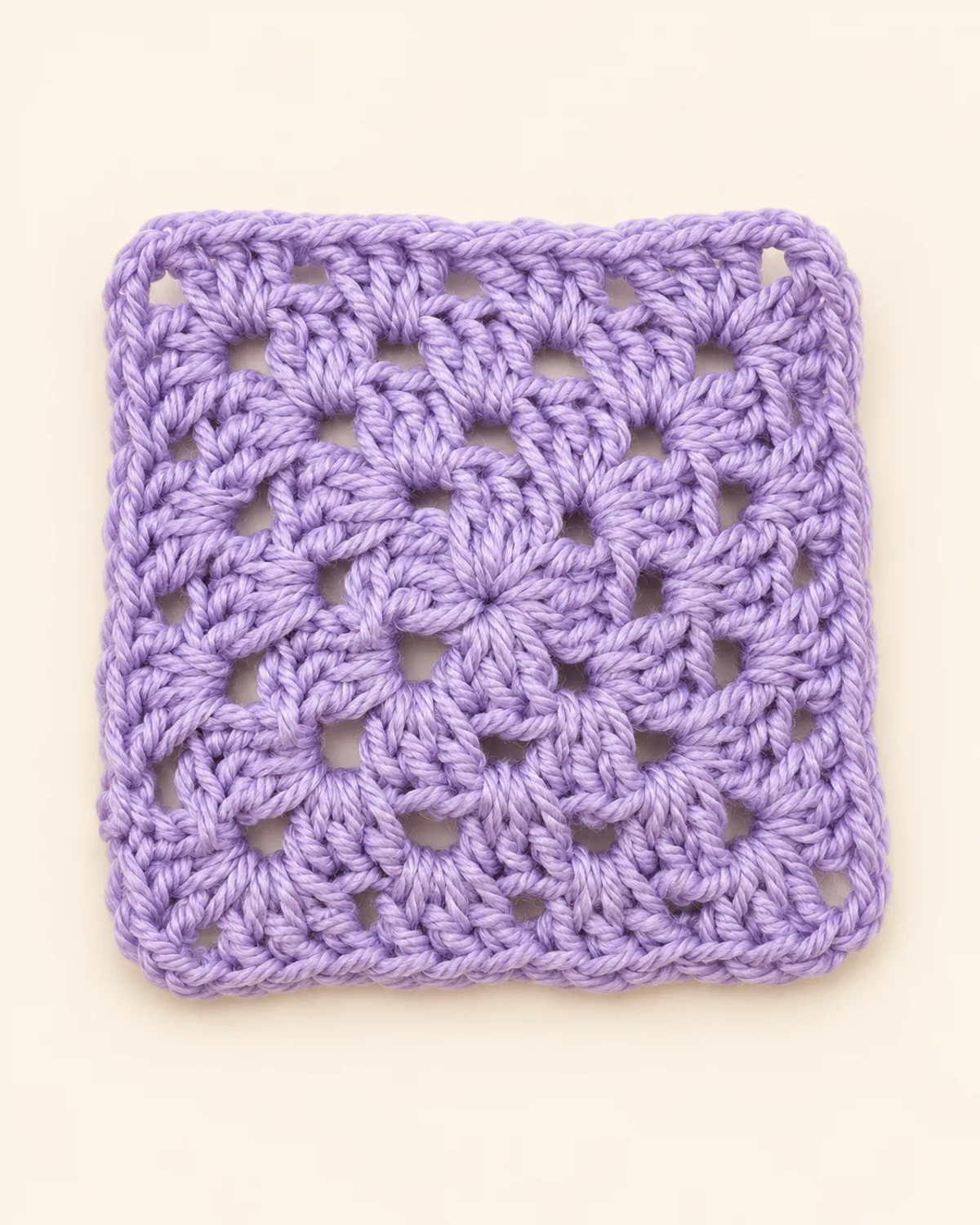 Classic Granny Square, finished product on a warm off-white background