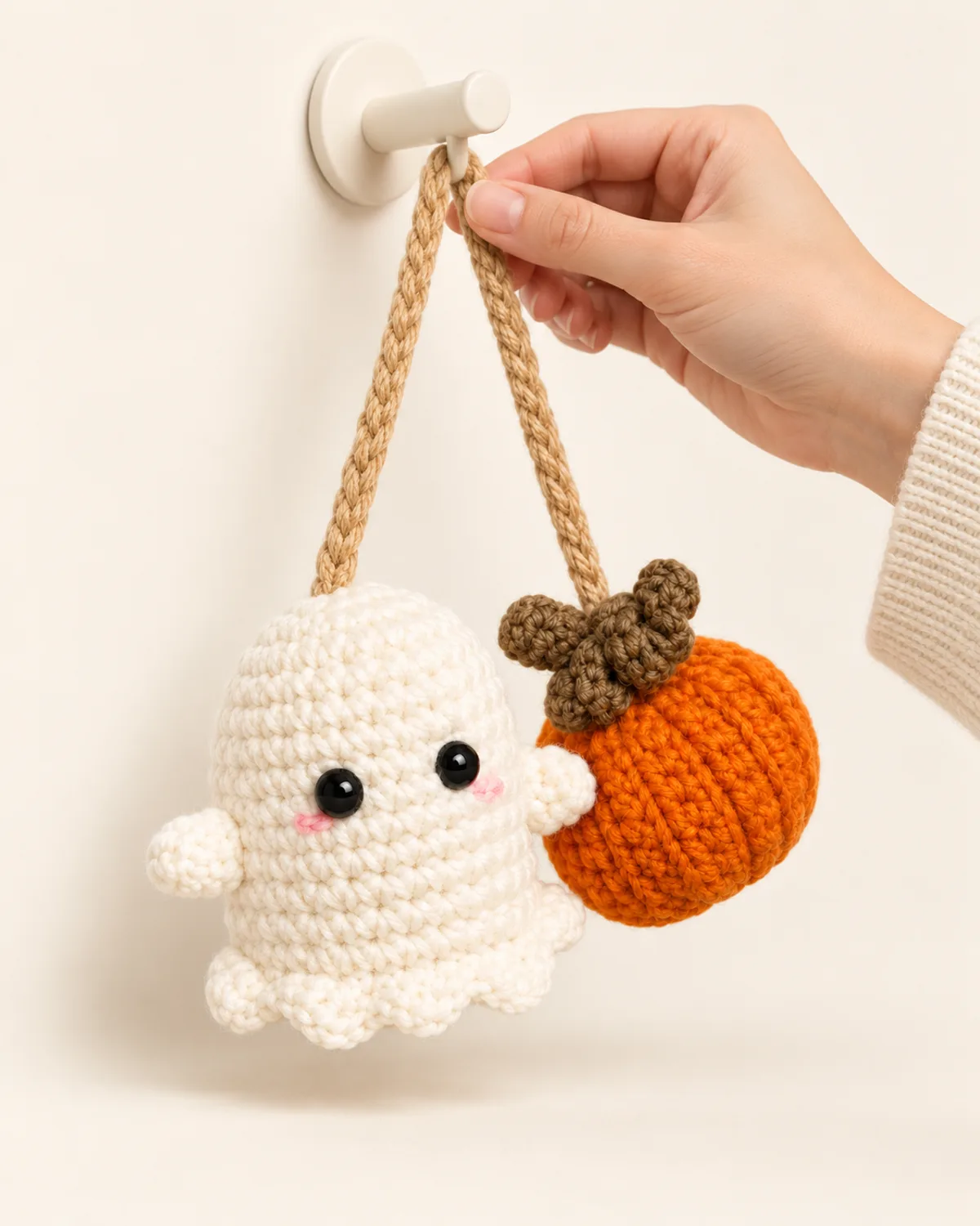 Ghost and Pumpkin Hanging Decoration, side three-quarter view in use