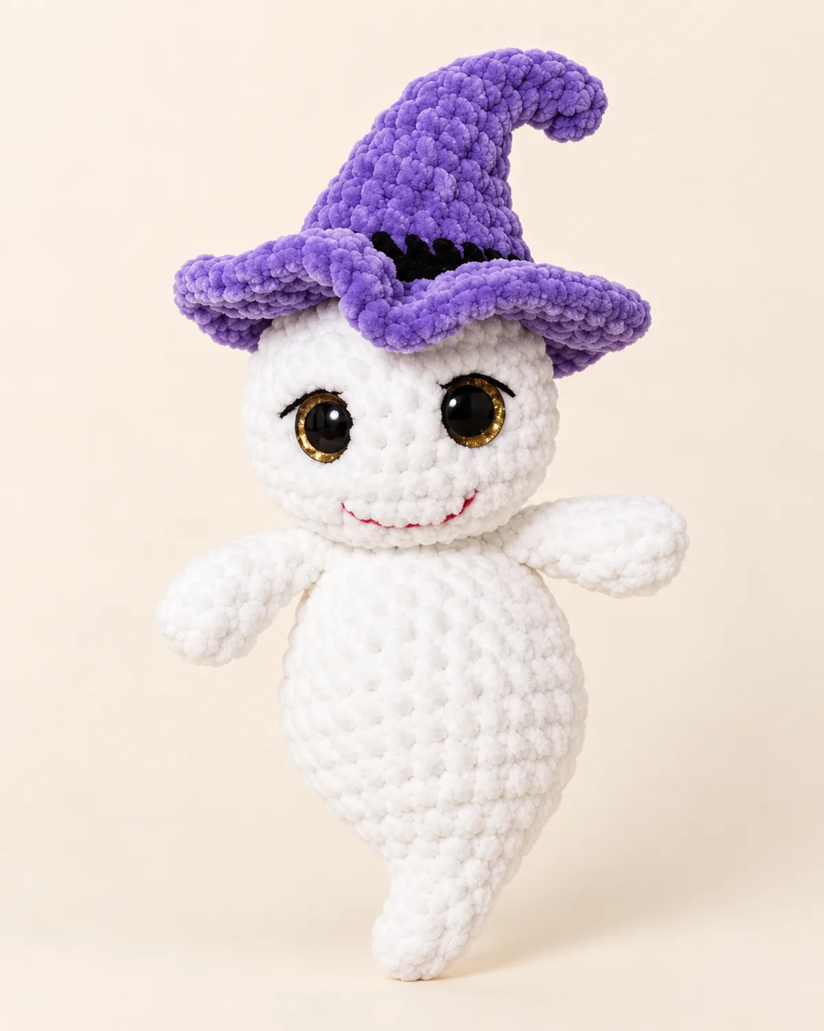Witch Ghost Plush, finished product on a warm off-white background