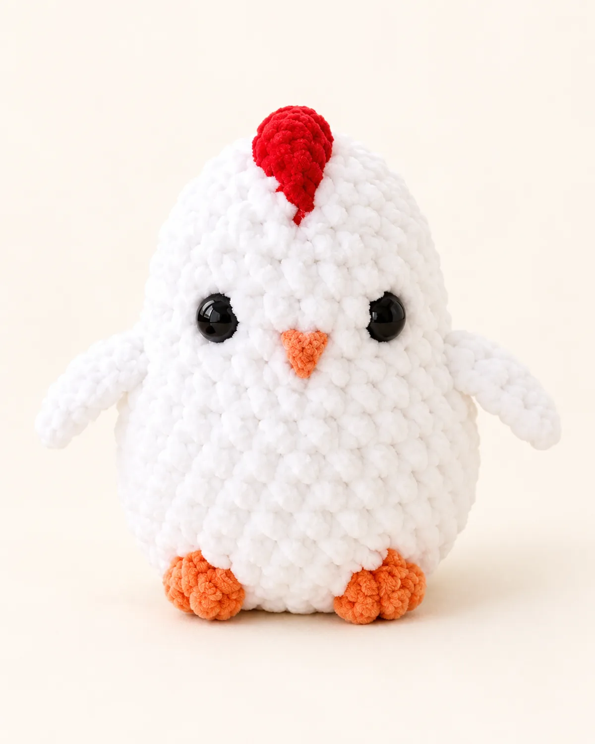 Hen Plush, finished product on a warm off-white background