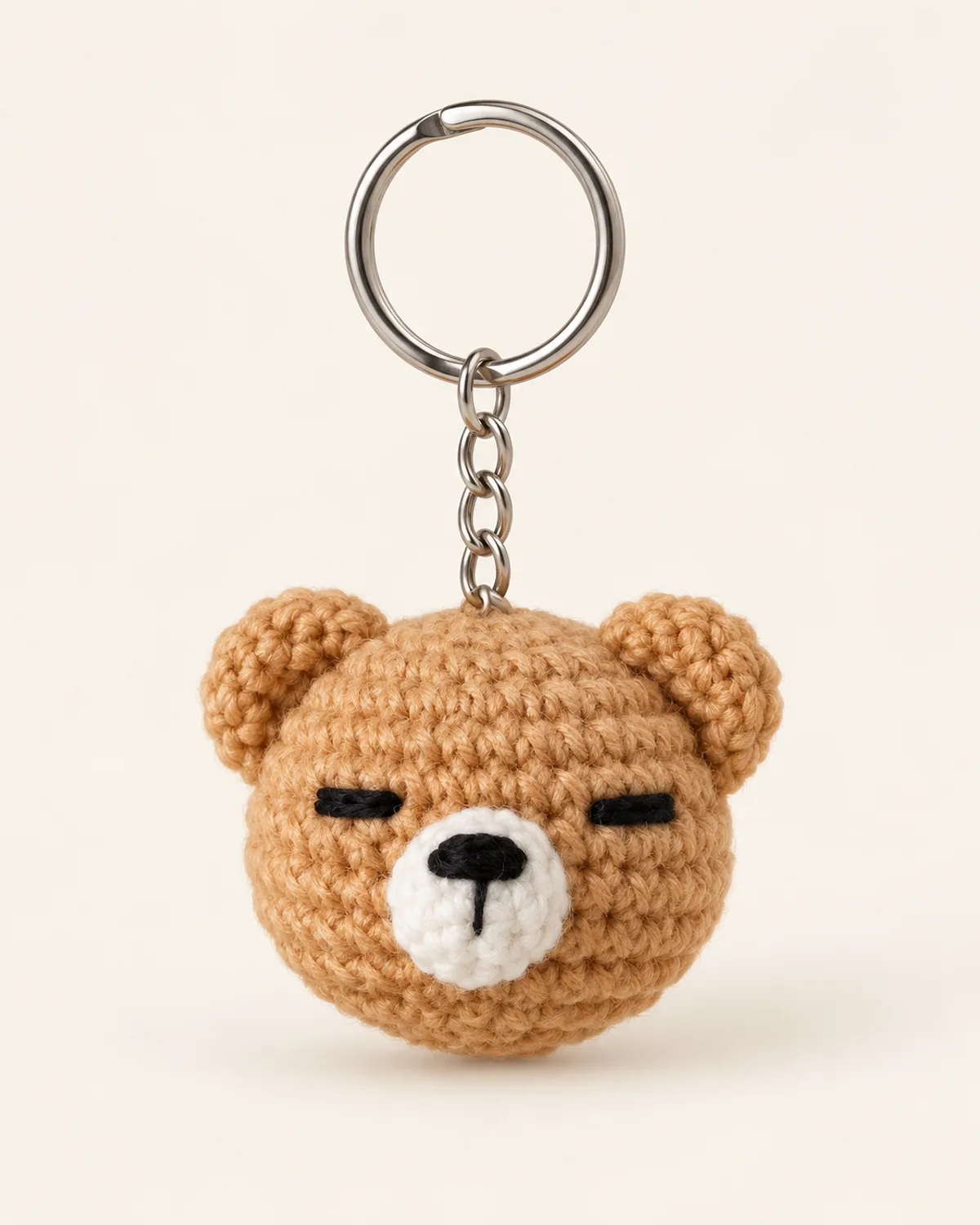 Bear Keychain, finished product on a warm off-white background