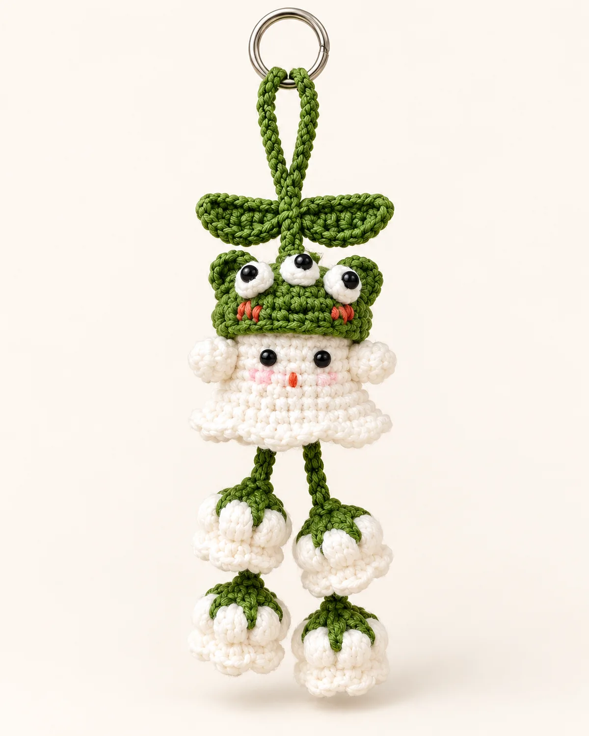 Ghost Bag Charm, finished product on a warm off-white background
