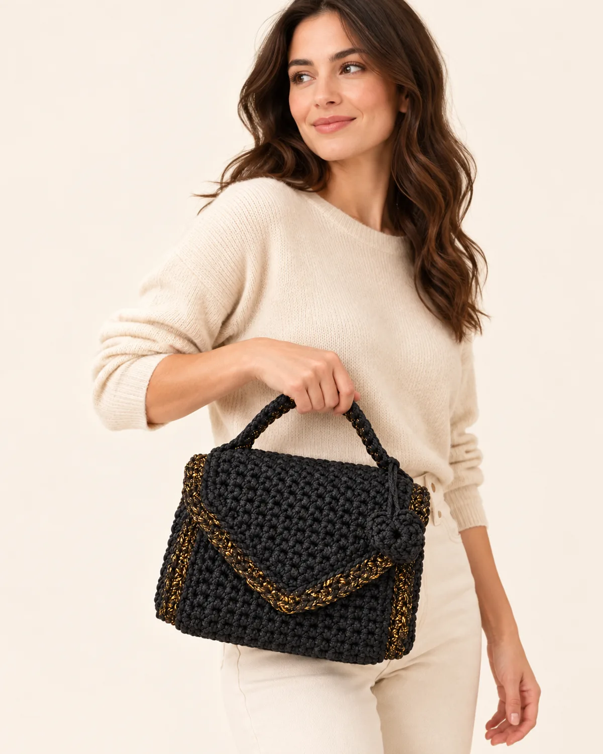 Black and Gold Handbag, front three-quarter view in use