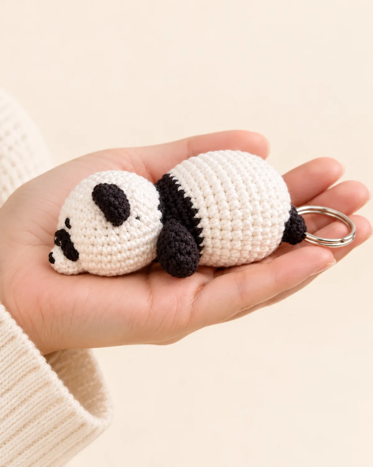 Panda Keychain, side three-quarter view in use