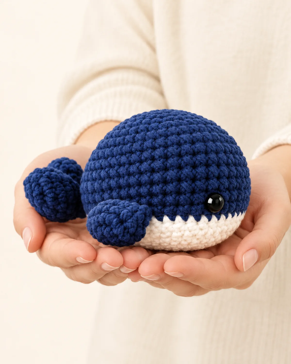 Navy Blue Whale Amigurumi, side three-quarter view in use
