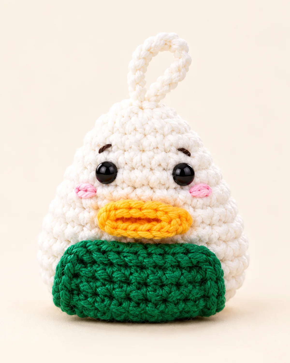 Kawaii Chick Onigiri, finished product on a warm off-white background