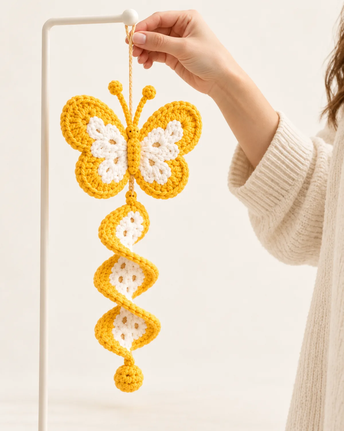 Butterfly Spiral Wind Spinner, side three-quarter view in use