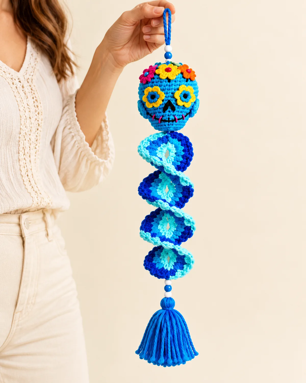 Sugar Skull Wind Spinner, front three-quarter view in use