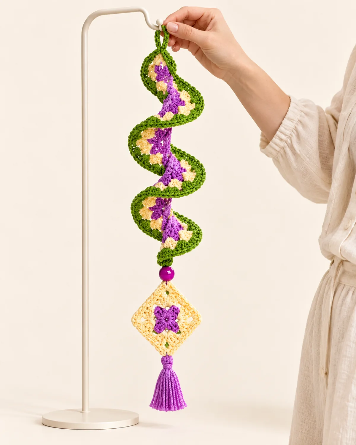Bohemian Diamond Talisman Spiral Wind Spinner, side three-quarter view in use