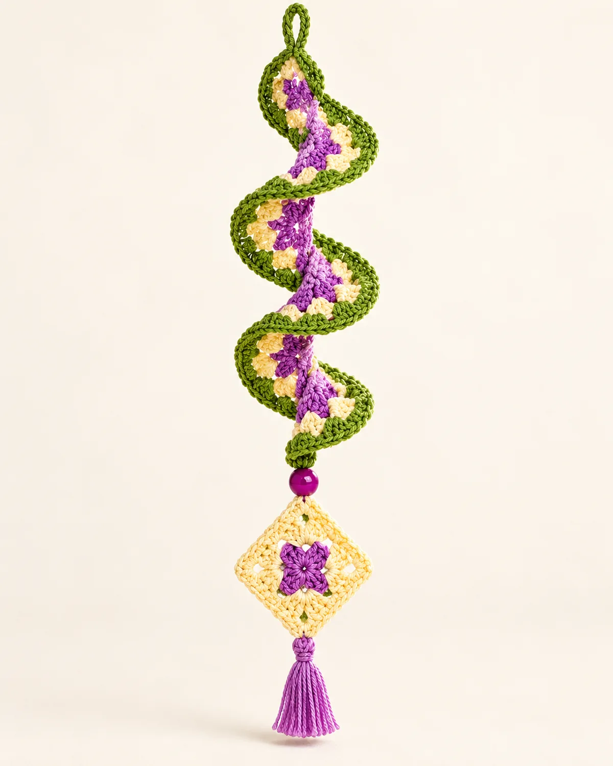 Bohemian Diamond Talisman Spiral Wind Spinner, finished product on a warm off-white background