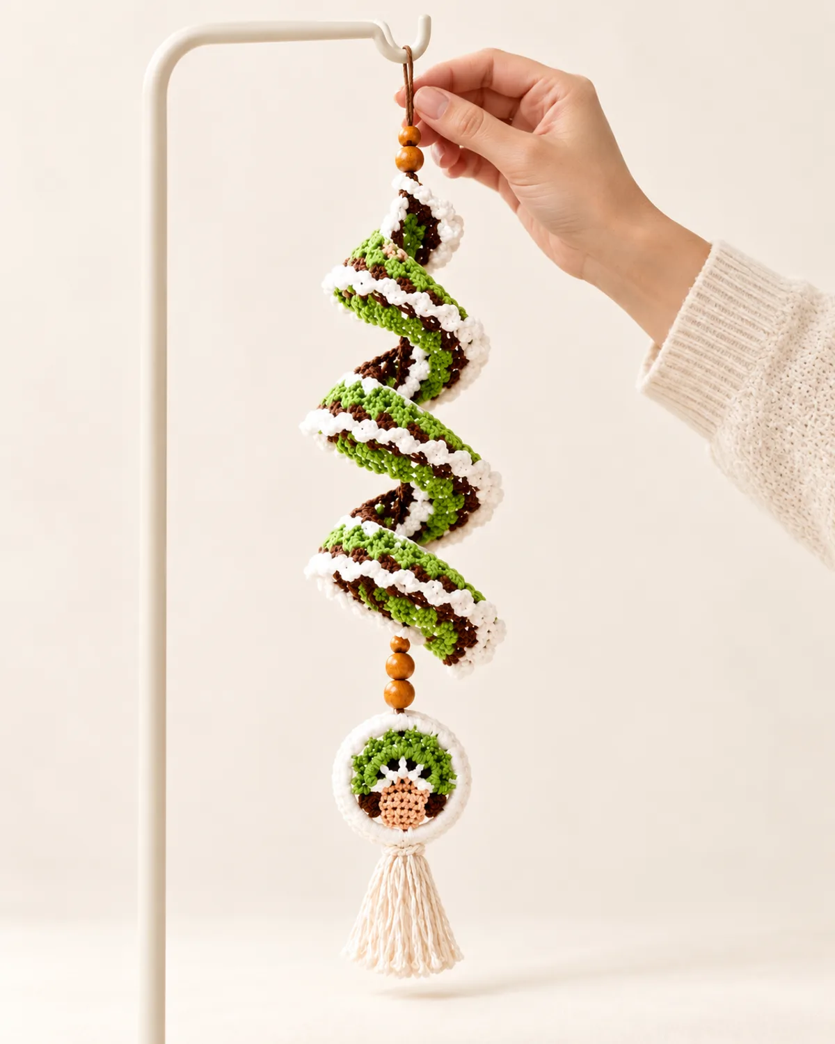 Woodland Bonsai Tree Spiral Wind Spinner, side three-quarter view in use