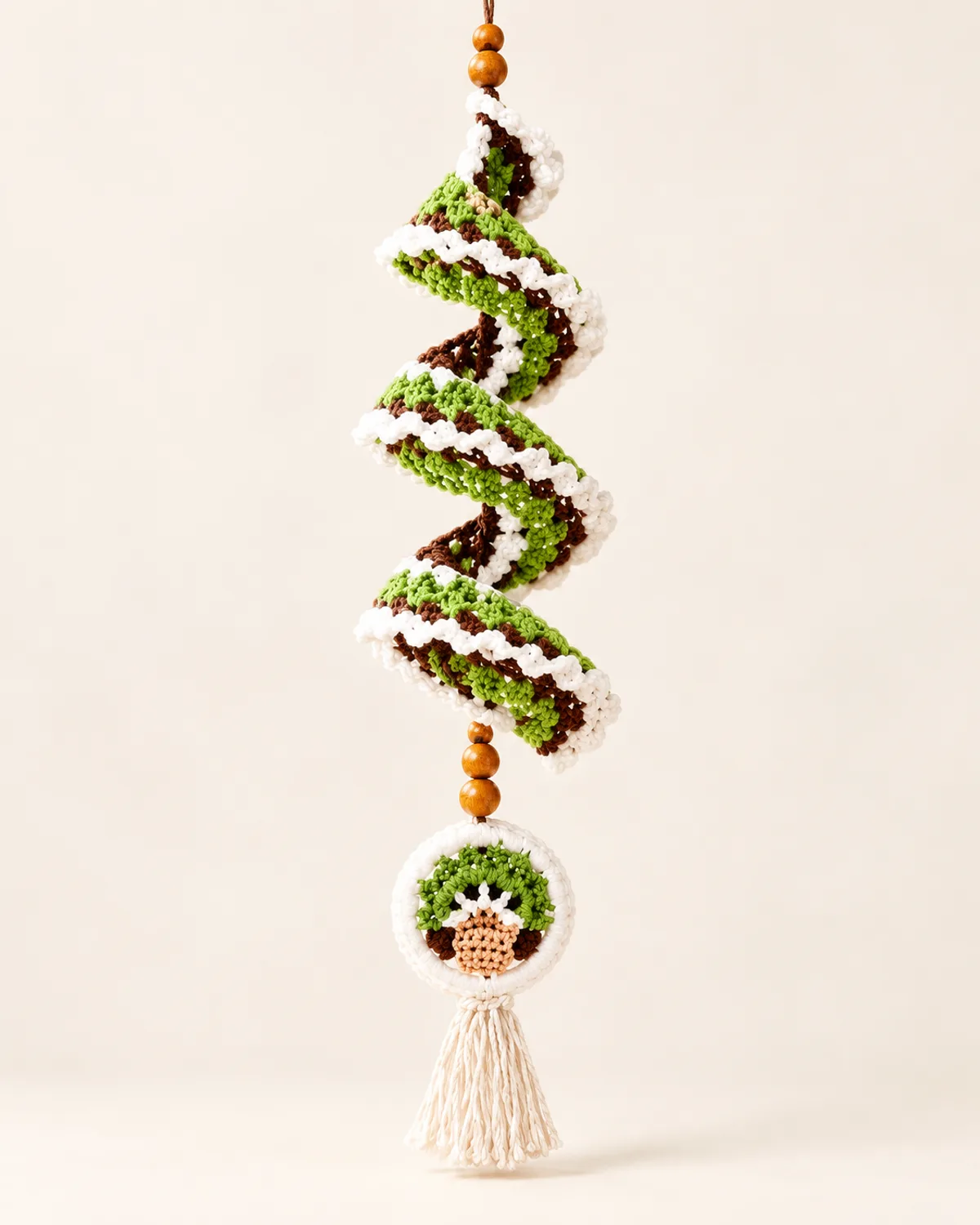 Woodland Bonsai Tree Spiral Wind Spinner, finished product on a warm off-white background