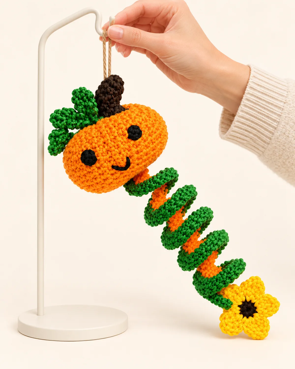 Pumpkin Spiral Wind Spinner, side three-quarter view in use